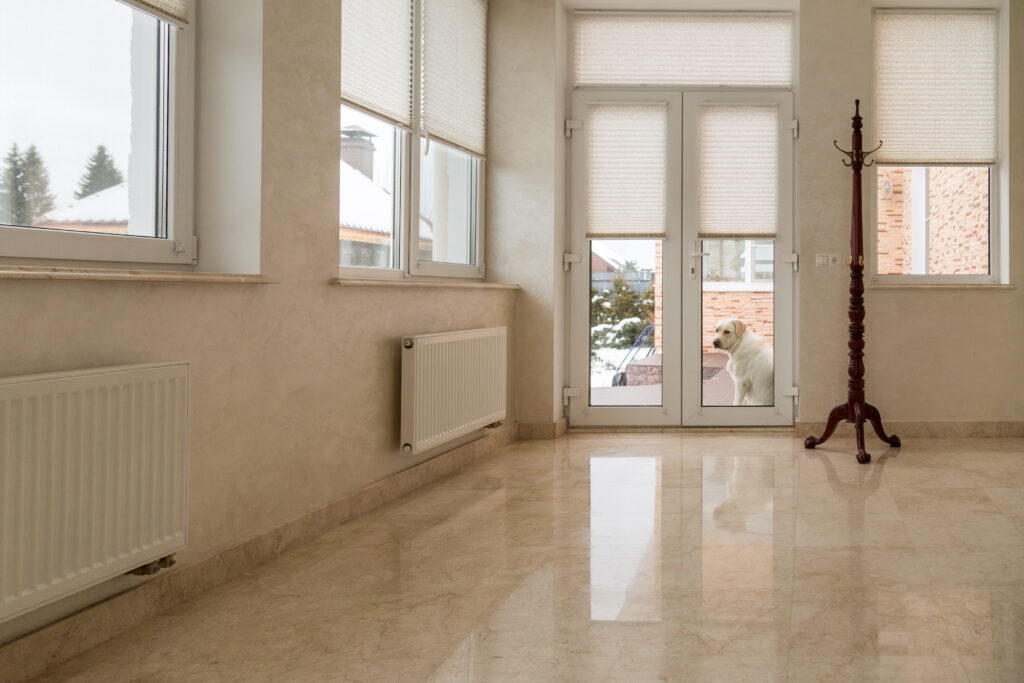 room in home with natural stone flooring